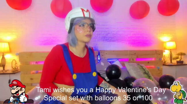 Tamara_Caprice Pops Some Balloons As Part Of A Super Mario Show